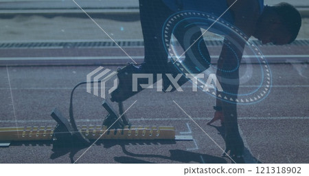 Runner on track with digital data processing image overlaid Runner on track with digital data processing image overlaid 121318902