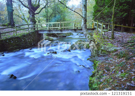Wooden Bridge over Bayones River in Ucieda, Cabuerniga Valley , Cantabria. Wooden Bridge over Bayones River in Ucieda, Cabuerniga Valley , Cantabria. 121319151