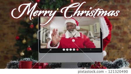 African American man dressed as Santa Claus on a video call, with copy space African American man dressed as Santa Claus on a video call, with copy space 121320490
