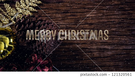 Image of merry christmas text over snow falling with christmas decorations 121320561