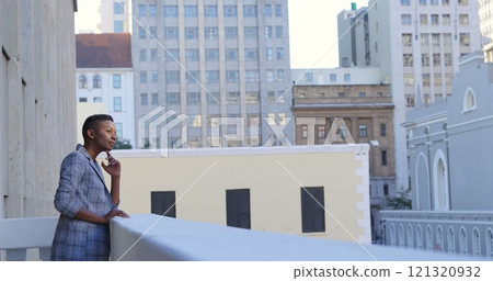 Thoughtful businesswoman standing in balcony at office 4k Thoughtful businesswoman standing in balcony at office 4k 121320932