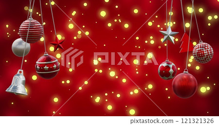 Image of christmas baubles and spots of light falling on red background Image of christmas baubles and spots of light falling on red background 121321326