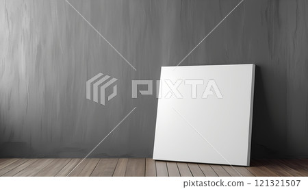 Blank square canvas leaning against a gray wall, arts architecture, indoor. 121321507