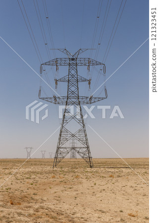 Electric power transmission infrastructure in arid Afghanistan landscape with high voltage lines 121323451