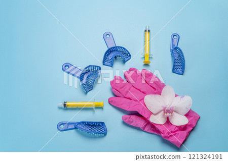 Dental pliant impression trays with latex gloves and syringes. Dental pliant impression trays with latex gloves and syringes. 121324191