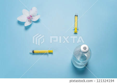 Plastic syringes with a bottle for liquid medicine. Plastic syringes with a bottle for liquid medicine. 121324194