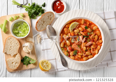 Pasulj, white bean soup with chicken in bowl 121325328