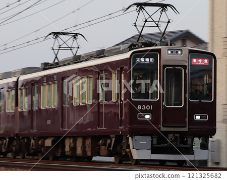 8300 series semi-express train (8301) speeding along the Hankyu Kyoto Line 121325682