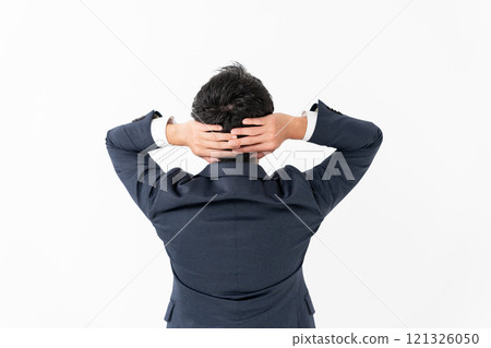 Businessman worried back view Businessman worried back view 121326050