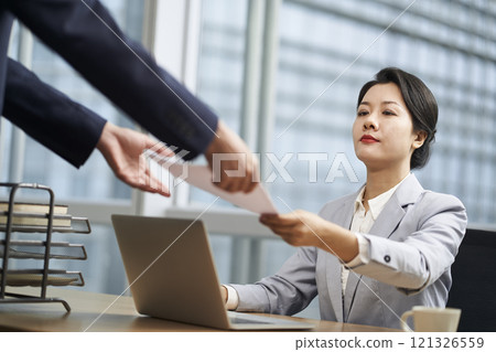 young asian business woman working in modern office 121326559