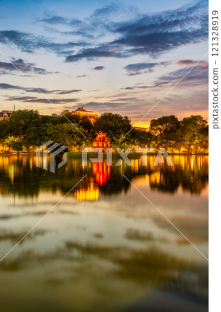 Hoan Kiem Lake ( Ho Guom) or Sword lake in the center of Hanoi in cinematic sunset sky. Hoan Kiem Lake ( Ho Guom) or Sword lake in the center of Hanoi in cinematic sunset sky. 121328919