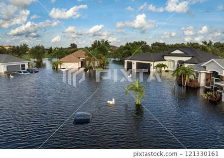 Hurricane Debby flooded city street with trapped car submerged under water in Florida residential area. Consequences of natural disaster Hurricane Debby flooded city street with trapped car submerged under water in Florida residential area. Consequences of natural disaster 121330161
