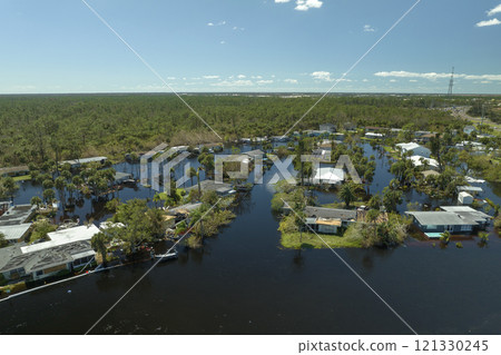 Heavy flood with high water surrounding residential houses after hurricane Ian rainfall in Florida residential area. Consequences of natural disaster 121330245