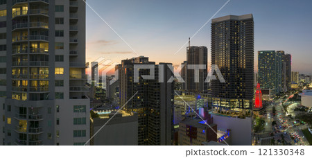 Evening urban landscape of downtown district of Miami Brickell in Florida, USA. Skyline with high skyscraper buildings in modern american megapolis Evening urban landscape of downtown district of Miami Brickell in Florida, USA. Skyline with high skyscraper buildings in modern american megapolis 121330348
