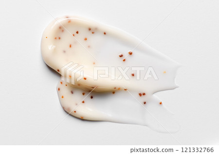 A sample of a cosmetic body care scrub. White background. 121332766
