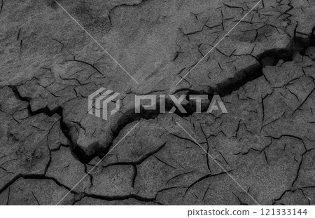 Parched Dead Soil With Cracks Texture Background. Stock Photo For Nature Disaster Illustration Parched Dead Soil With Cracks Texture Background. Stock Photo For Nature Disaster Illustration 121333144