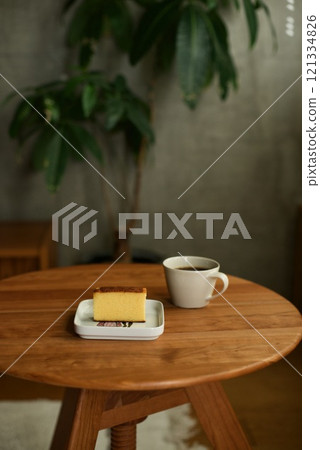 Hot coffee and a castella cake snack Hot coffee and a castella cake snack 121334826