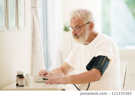 Senior man measuring blood pressure Senior man measuring blood pressure 121335565