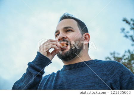Happy Reaction to a Tasty Biscuit 121335603