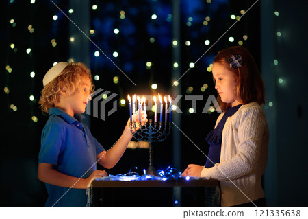 Kids celebrating Hanukkah. Festival of lights. 121335638