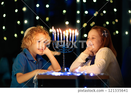 Kids celebrating Hanukkah. Festival of lights. Kids celebrating Hanukkah. Festival of lights. 121335641