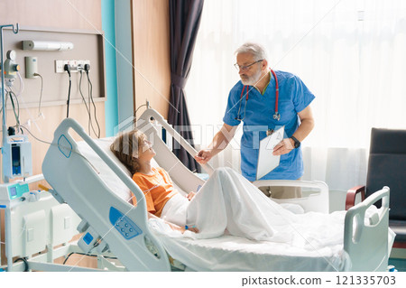 Sick child in hospital room. Kid in clinic ward. 121335703