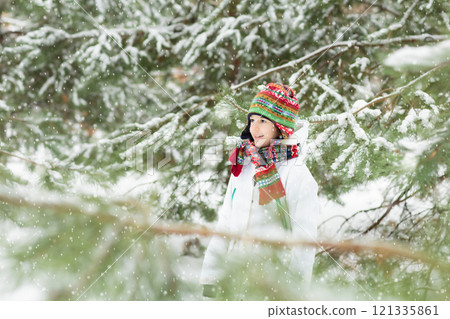 Kids play in snow in winter park Kids play in snow in winter park 121335861