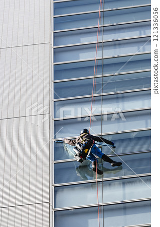 Cleaning windows in high-rise buildings 121336056