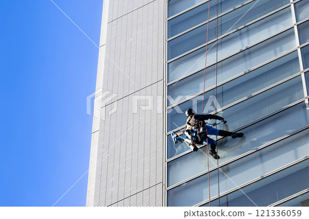Cleaning windows in high-rise buildings 121336059