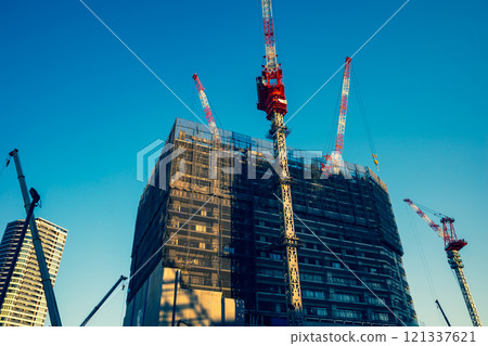 Cityscape with an apartment building construction site h-3 Emphasis on warm and cool colors 121337621