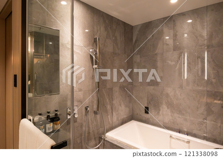 A beautiful bathroom in a guest room at Mesm Tokyo, a luxury hotel located in Waters Takeshiba near Hamamatsucho Station and Takeshiba Station. 121338098