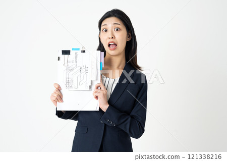 A woman in the accounting department is worried about her expense report 121338216