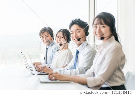Men and women of the call center operator team (teleoperation/teleappointment) Men and women of the call center operator team (teleoperation/teleappointment) 121338413