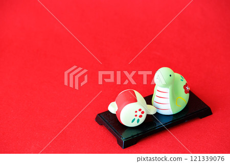 Image of a magic mallet and the New Year's celebrations for the Year of the Snake Image of a magic mallet and the New Year's celebrations for the Year of the Snake 121339076