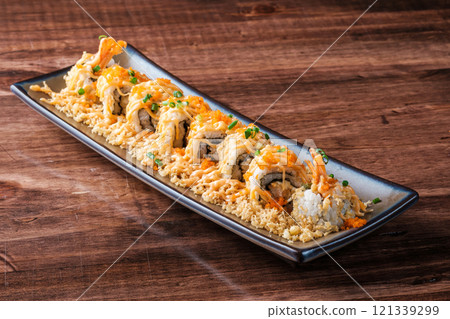 Japanese Spicy Tempura Shrimp Sushi with Crunchy Topping 121339299