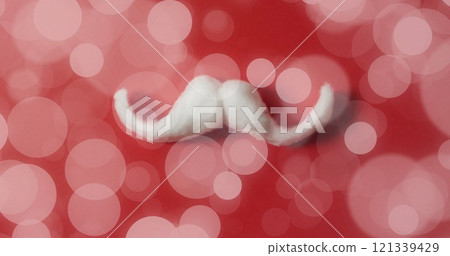 White mustache on red background with bokeh lights image 121339429