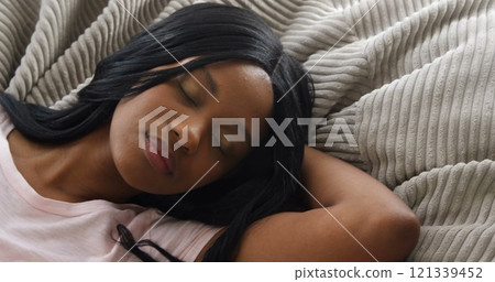 Woman sleeping in bedroom at home Woman sleeping in bedroom at home 121339452