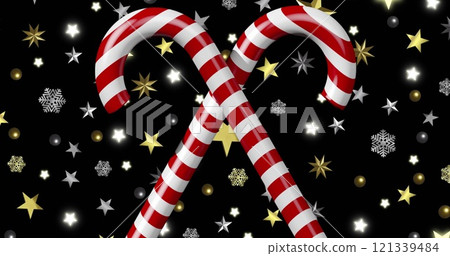 Image of candy canes over christmas decorations on black background Image of candy canes over christmas decorations on black background 121339484
