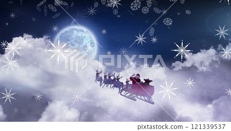 Image of snow falling over christmas santa claus in sleigh with reindeer 121339537