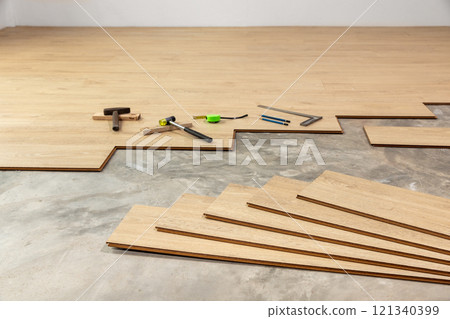 DIY Tips for Installing Interlocking Laminate Flooring DIY Tips for Installing Interlocking Laminate Flooring 121340399