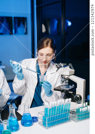 Scientist two woman with tablet and laptop, laboratory and ecofriendly science. Agriculture, research and scientists with online reading, test samples Scientist two woman with tablet and laptop, laboratory and ecofriendly science. Agriculture, research and scientists with online reading, test samples 121342974