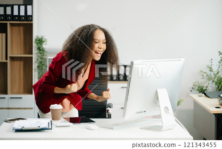 Confident business expert attractive smiling young woman holding digital tablet on desk in creative office. Confident business expert attractive smiling young woman holding digital tablet on desk in creative office. 121343455