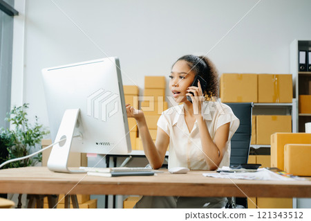Small business entrepreneur SME freelance woman working at home office, BOX,tablet 121343512