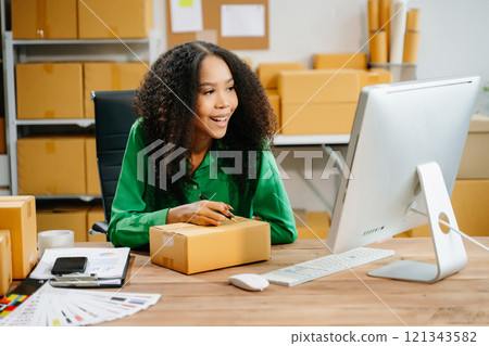 Startup small business SME, Entrepreneur owner woman using smartphone or tablet taking receive 121343582
