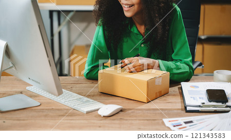 Startup small business SME, Entrepreneur owner woman using smartphone or tablet taking receive Startup small business SME, Entrepreneur owner woman using smartphone or tablet taking receive 121343583