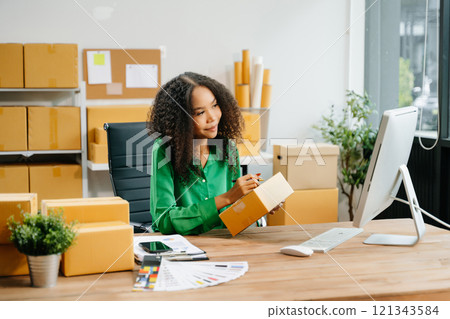 Startup small business SME, Entrepreneur owner woman using smartphone or tablet taking receive Startup small business SME, Entrepreneur owner woman using smartphone or tablet taking receive 121343584