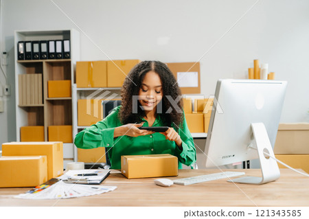 Small business entrepreneur SME freelance woman working at home office, BOX,tablet 121343585