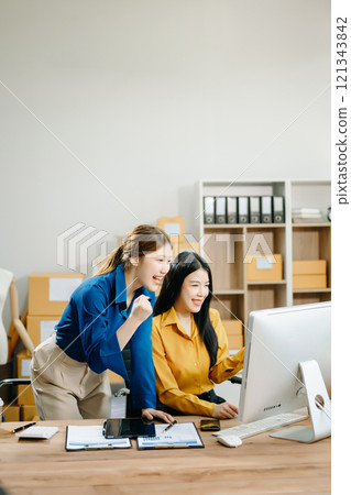 Starting small businesses SME owners, two check online orders Selling products working with boxs freelance work 121343842