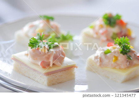 canape or toast with ham , cheese , crab stick and tuna canape or toast with ham , cheese , crab stick and tuna 121345477