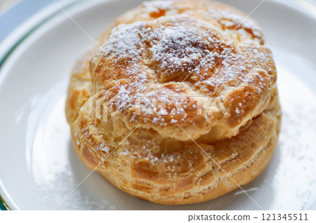 choux cream or cream puff, eclair choux cream or cream puff, eclair 121345511
